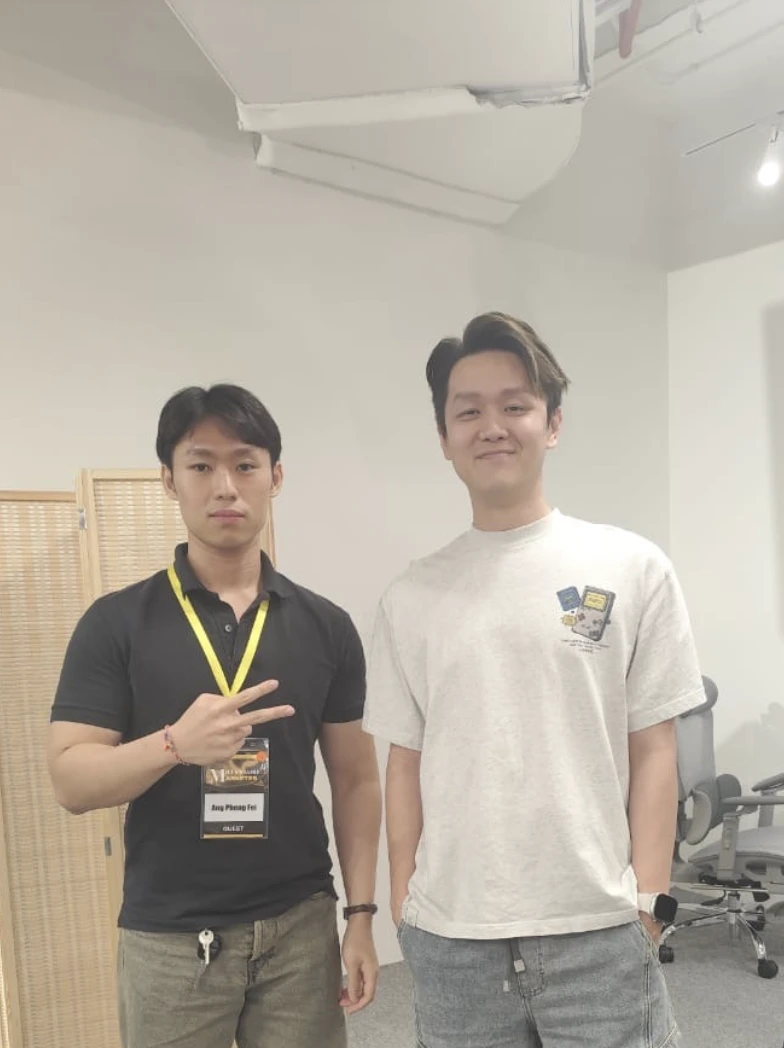 Travis with his mentor Jackson Yew